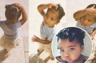 it’s hot!! True Thompson saying 'agua' so cute in garden