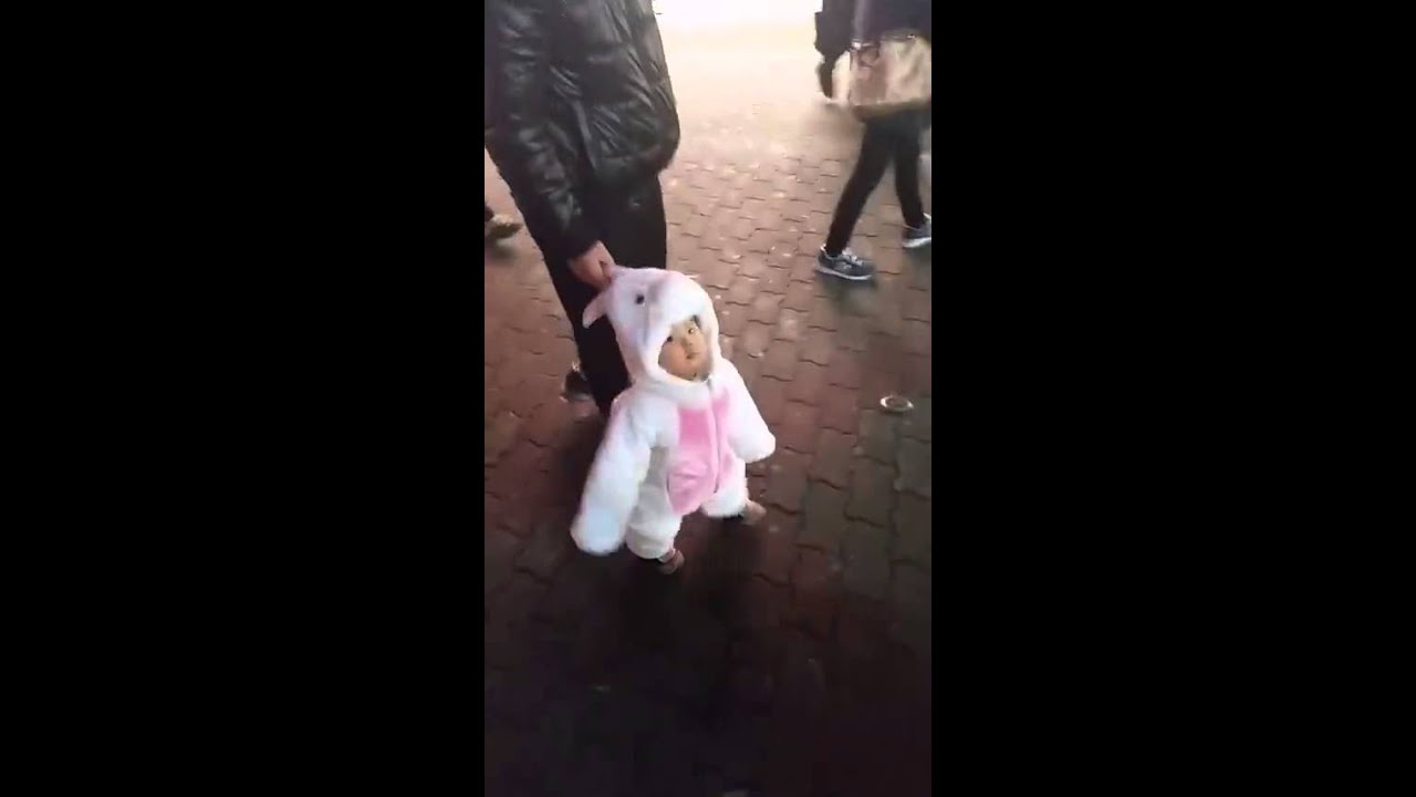 Toddler walks in adorable bunny costume