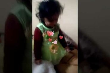 The cute girl is playing with his stuff rabbit😊😊😊