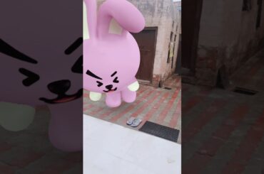 Cute pink rabbit dancing .