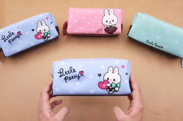 cute turquoise and blue bunny dot pencil case by Mind Wave