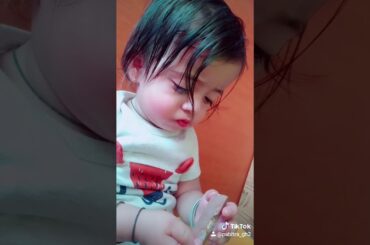 Cute baby eating chocolate ..