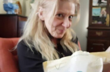 Wild baby bunny eating hay