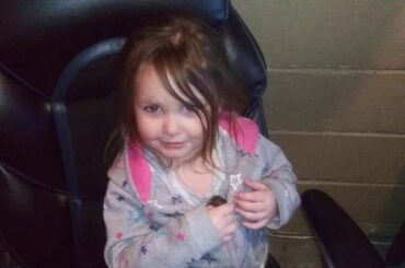 Summer holding the baby bunny rabbit