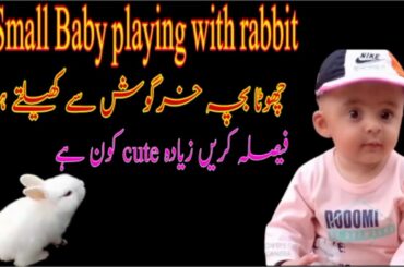 #Small baby playing with rabbit ! Life is Exam