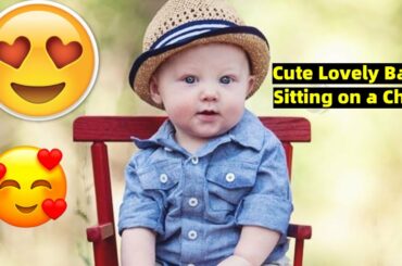 Cute Lovely Baby Sitting on a Chair