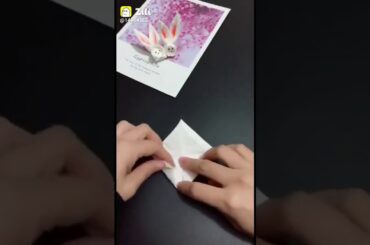 Cute bunny rabbit with paper