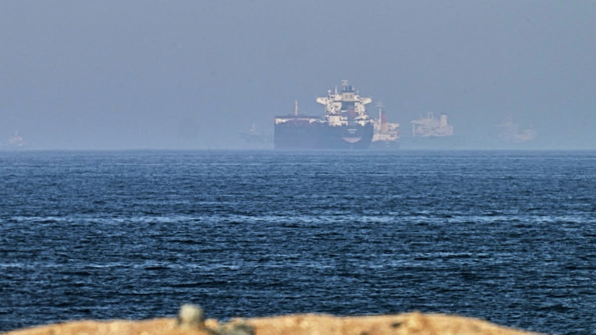 India Needs Multi-Route Energy Strategy As West Asia Tensions Threaten Supplies: Experts FILE - Cargo ships are seen at sea near the Strait of Hormuz, as viewed from a rocky shoreline near Khor Fakkan, United Arab Emirates, Friday, May 1, 2026.