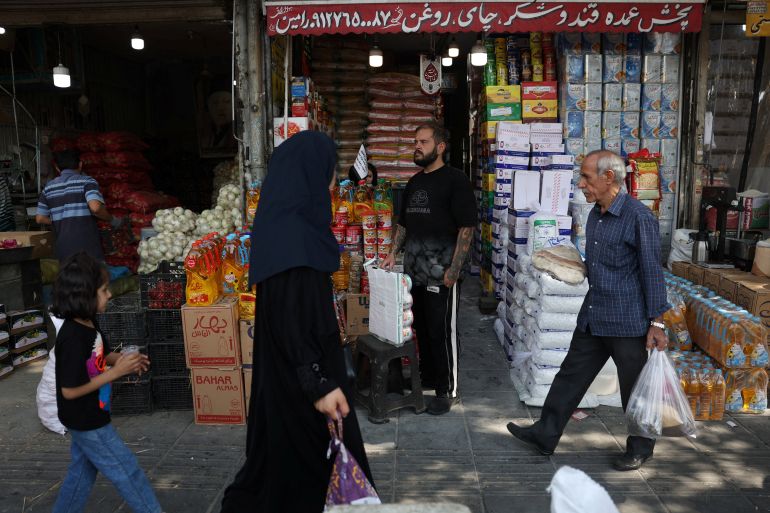 People walk in a local market in Tehran, Iran, September 26, 2026. [Majid Asgaripour/WANA]