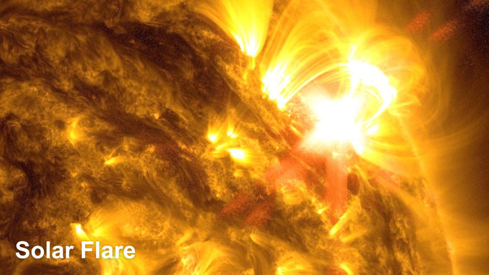 NASA's Solar Dynamics Observatory captured this image of a strong solar flare (the bright flash of light on the right) on May 8, 2024. The image shows a blend of 171 and 131 Angstrom light, subsets of extreme ultraviolet light.